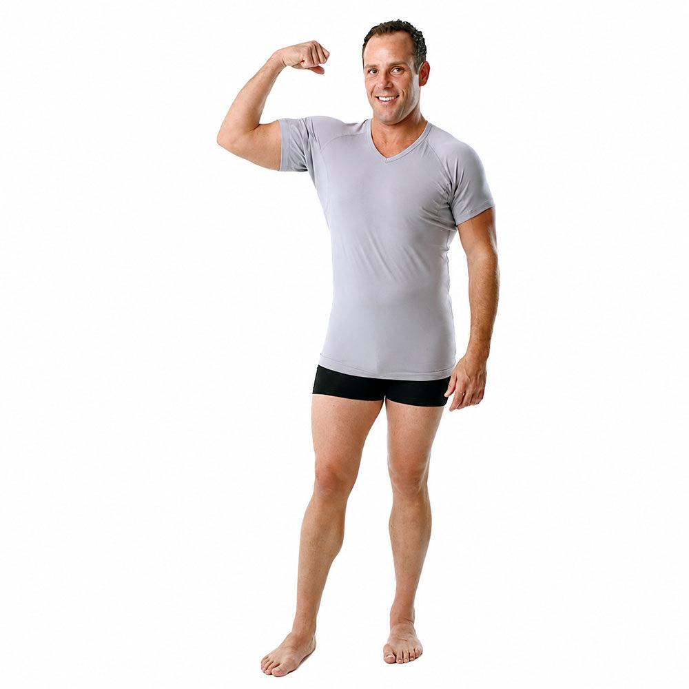 Man wearing an Ejis grey cotton sweat proof undershirts and black underwear on a white background