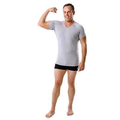 Man wearing an Ejis grey cotton sweat proof undershirts and black underwear on a white background