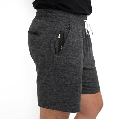 side view of dark grey Ejis Conquest athletic shorts with zippered pocket